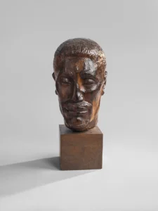 John Rhoden, (1916-2001) Invictus, 1948 Rosewood on wood base 19 1/2 x 8 1/2 x 9 in. The John Walter Rhoden and Richanda Phillips Rhoden Collection