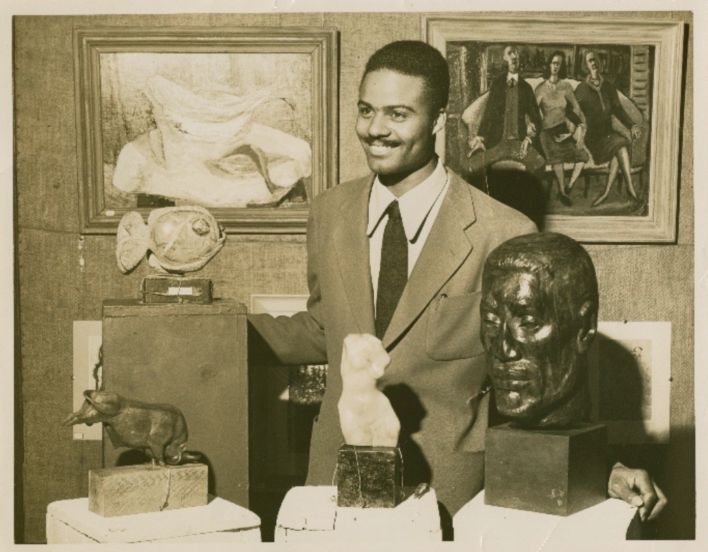 John Rhoden with several of his sculptures at Columbia University, New York, ca. 1947-50, John Rhoden papers